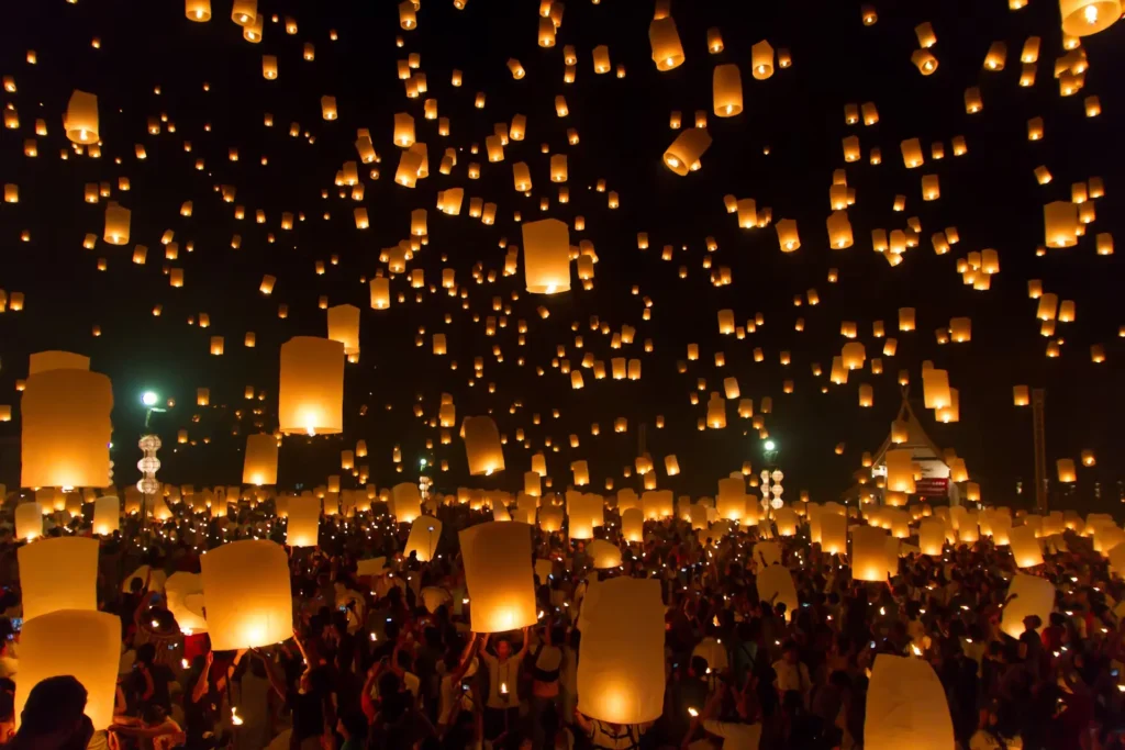 ribuan lampu diterbangkan ke langit saat festival lantern